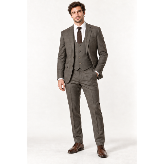 A man modeling a taupe plaid 3-piece suit